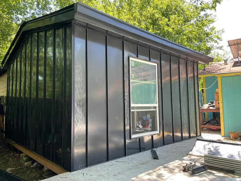 Black standing seam metal wall panels for Roof Inspection in Forest City